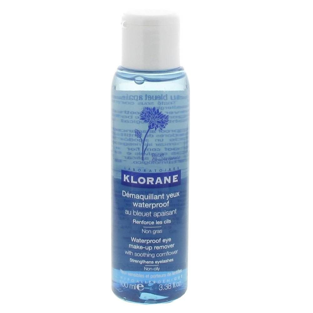 Klorane démaquillant yeux waterproof. Liquide bleu dans flacon avec bouchon blanc. Texte: Démaquillant yeux waterproof au bleuet apaisant.