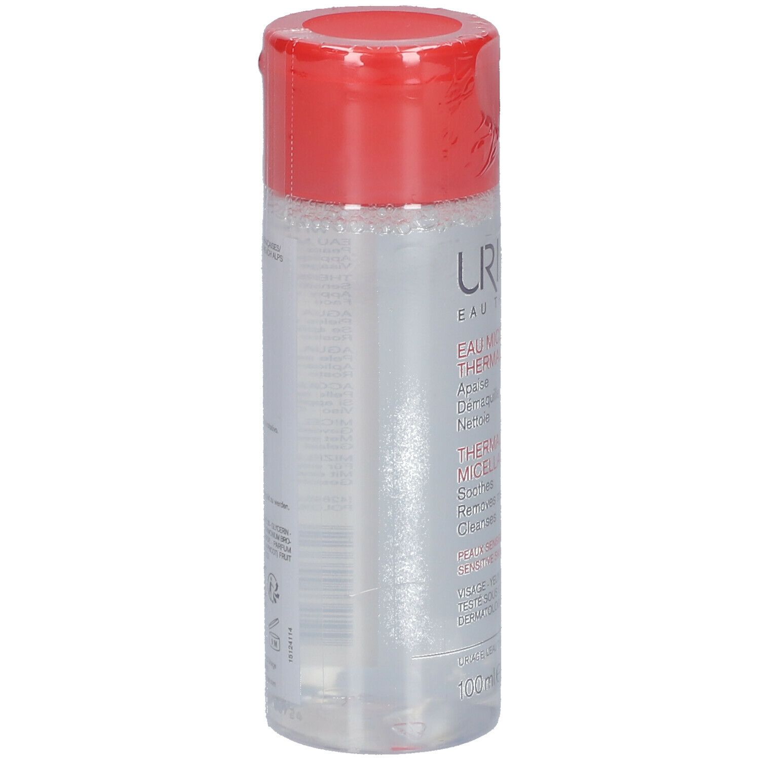 Uriage Eau Micellaire Thermale. Flacon transparent, bouchon rouge. Inscription et texte sur l'étiquette.