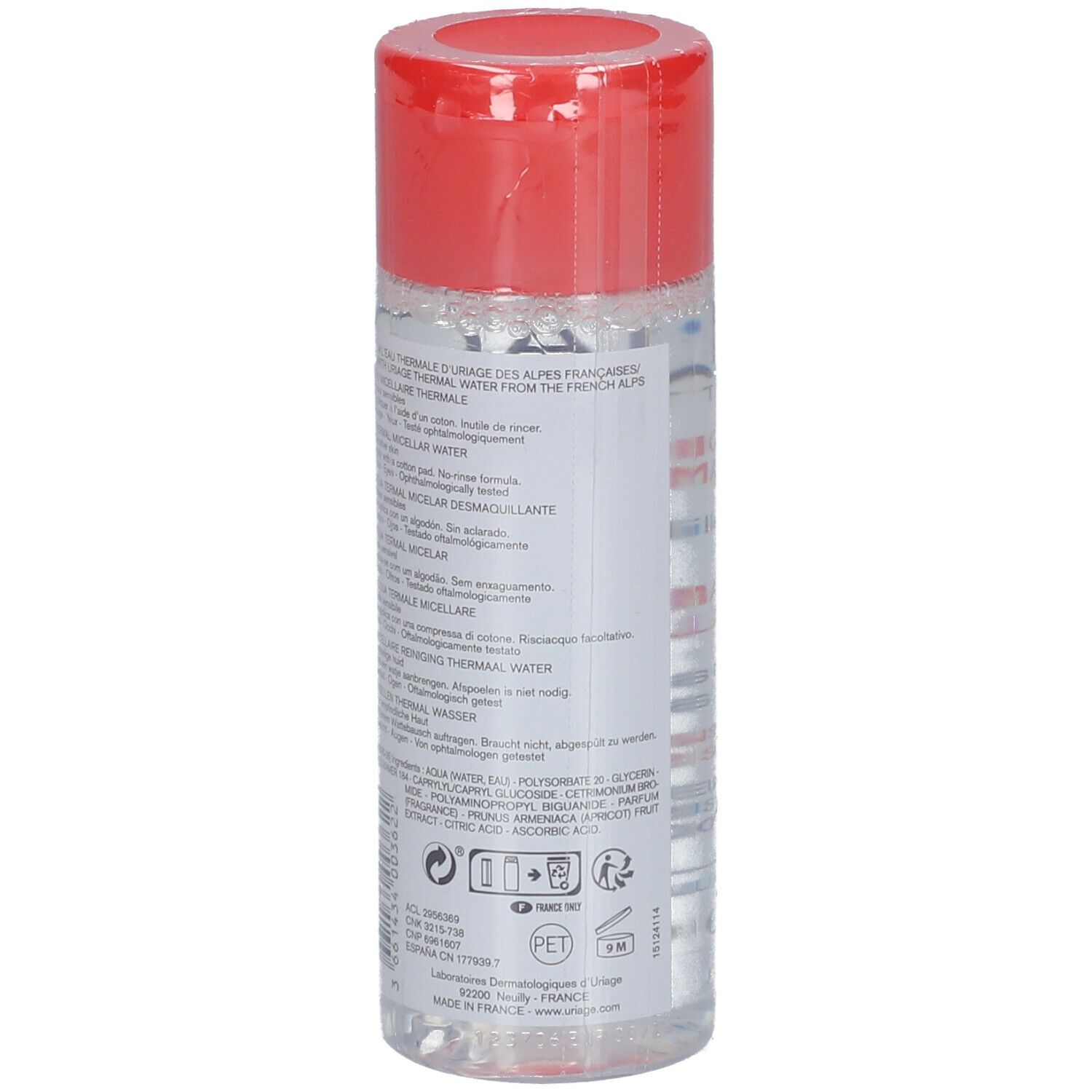 Uriage Eau Micellaire Thermale. Flacon transparent, bouchon rouge. Inscription et texte sur l'étiquette.
