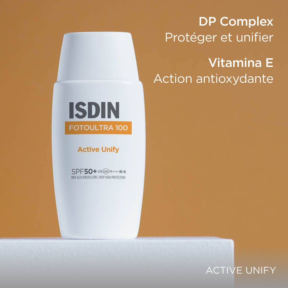 Flacon blanc avec texte. Texte: DP Complex protège et unifie, Vitamine E, action antioxydante.