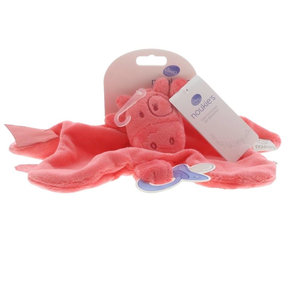 Doudou rose Lola de Noukies. Form de cochon avec tétine. Étiquette avec logo de la marque. Matière douce.