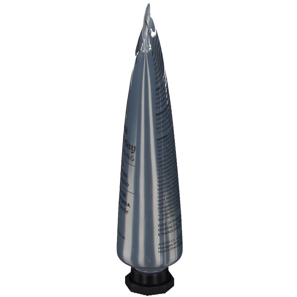 Tube argenté, effilé. Bouchon noir. Inscription illisible. Dos avec texte.