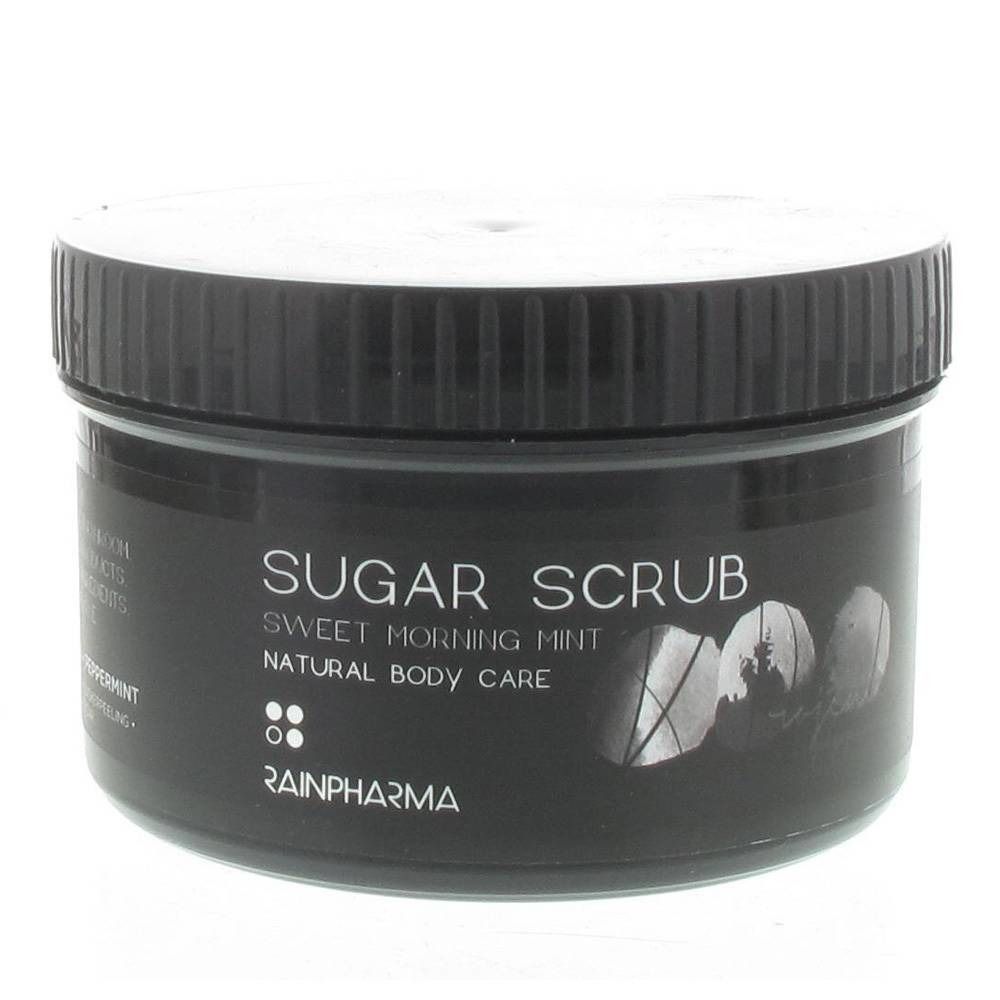 Schwarzes Tiegel mit weißem Deckel. Aufschrift: Sugar Scrub, Sweet Morning Mint, Natural Body Care. Marke: RAINPHARMA.