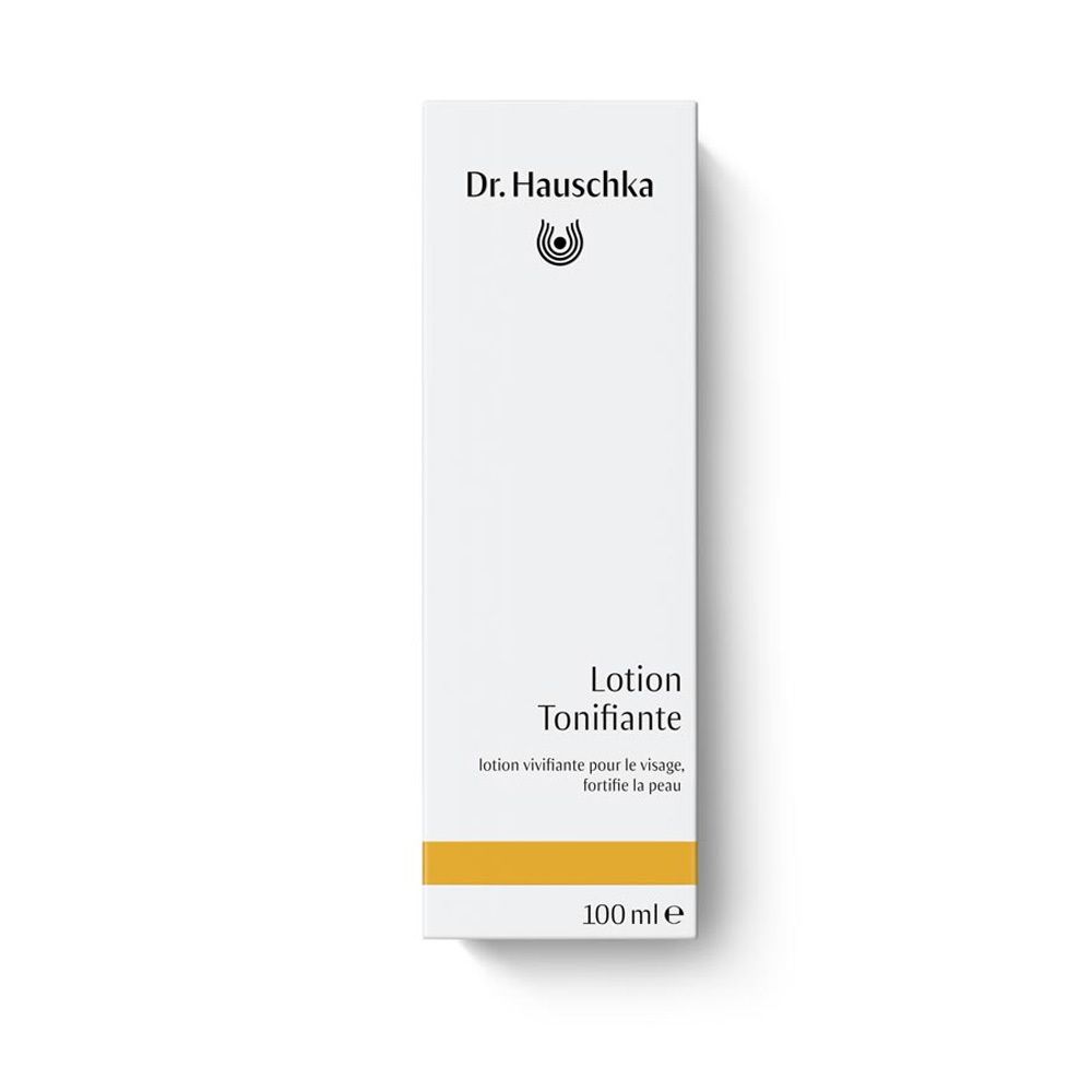 Weiße Verpackung mit Logo und Schriftzug 'Lotion Tonifiante'. Enthält eine Flasche mit Flüssigkeit. Unten gelber Streifen.