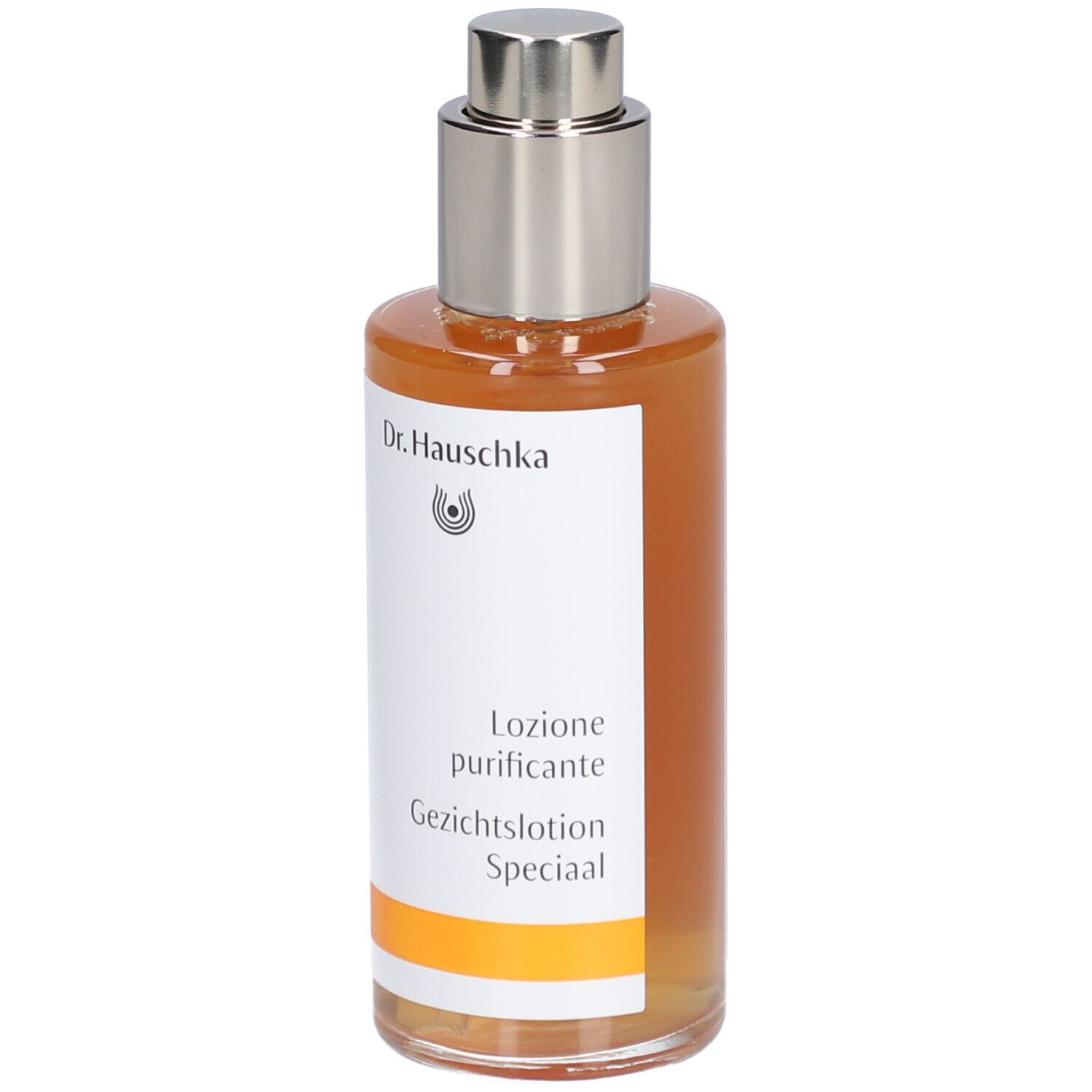 Flacon en verre avec liquide ambré et bouchon argenté. Étiquette avec logo Dr. Hauschka et nom du produit.