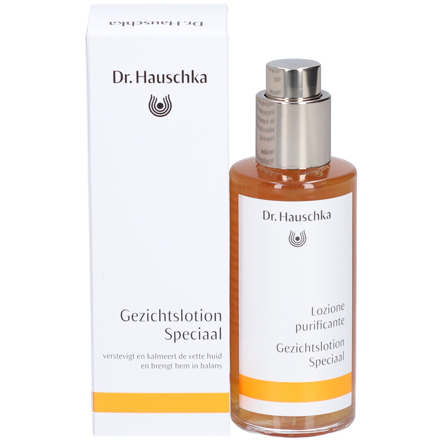 Flacon en verre avec liquide ambré et bouchon argenté, à côté d'un emballage blanc. Dr. Hauschka est écrit sur l'emballage.
