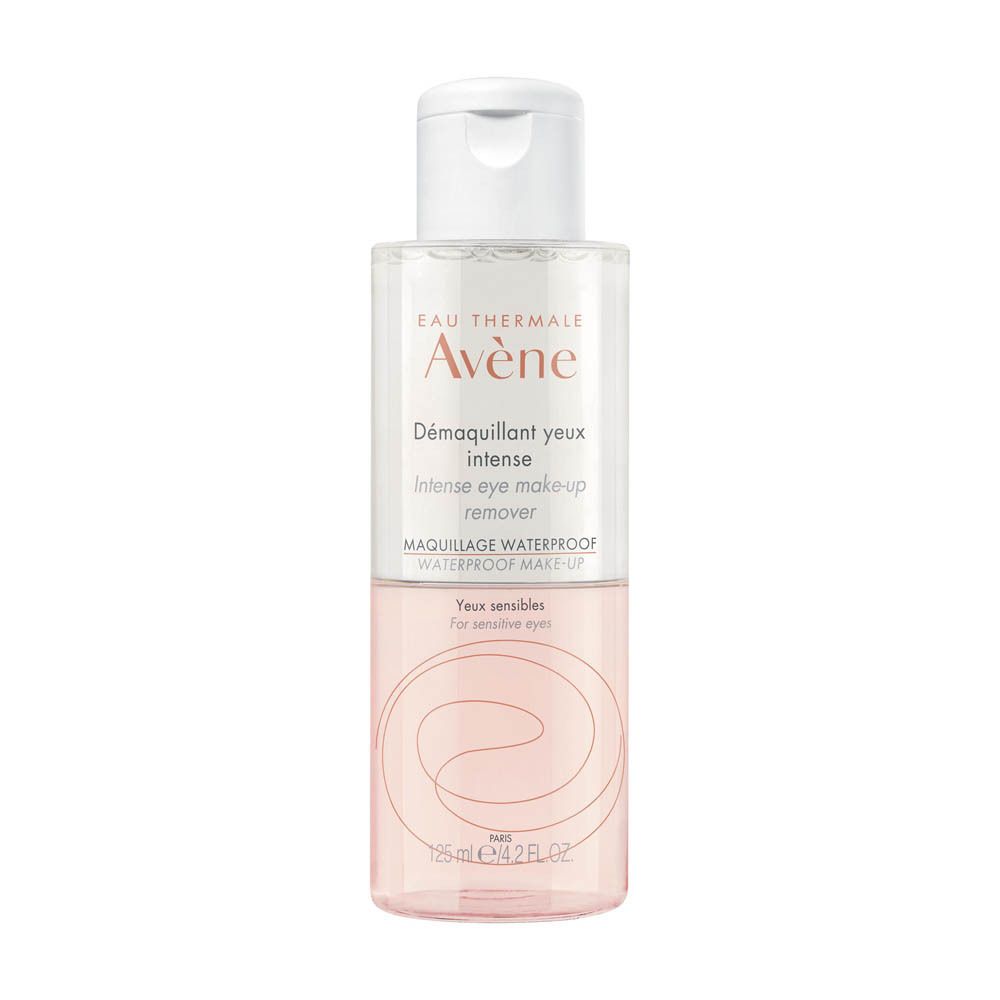 Avène Démaquillant yeux intense, transparente Flasche mit weißem Deckel. Rosa Flüssigkeit. Text: Intense eye make-up remover.