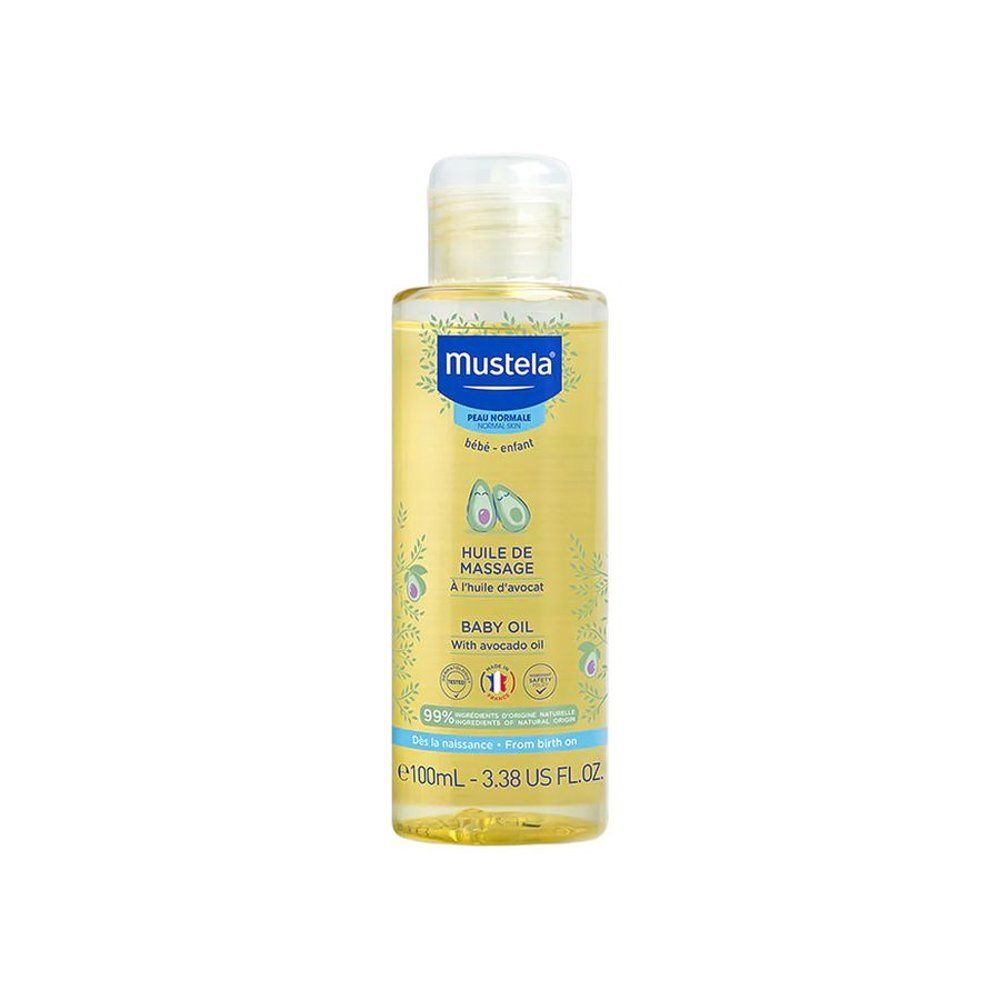Flacon d'huile pour bébé Mustela® à l'avocat. Liquide jaune, bouchon blanc. Étiquette avec informations.