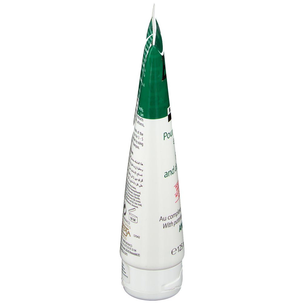Seitenansicht der Tube Ecrinal ANP 2+ Haarmaske. Text in mehreren Sprachen. Volumenangabe: 125 ml.