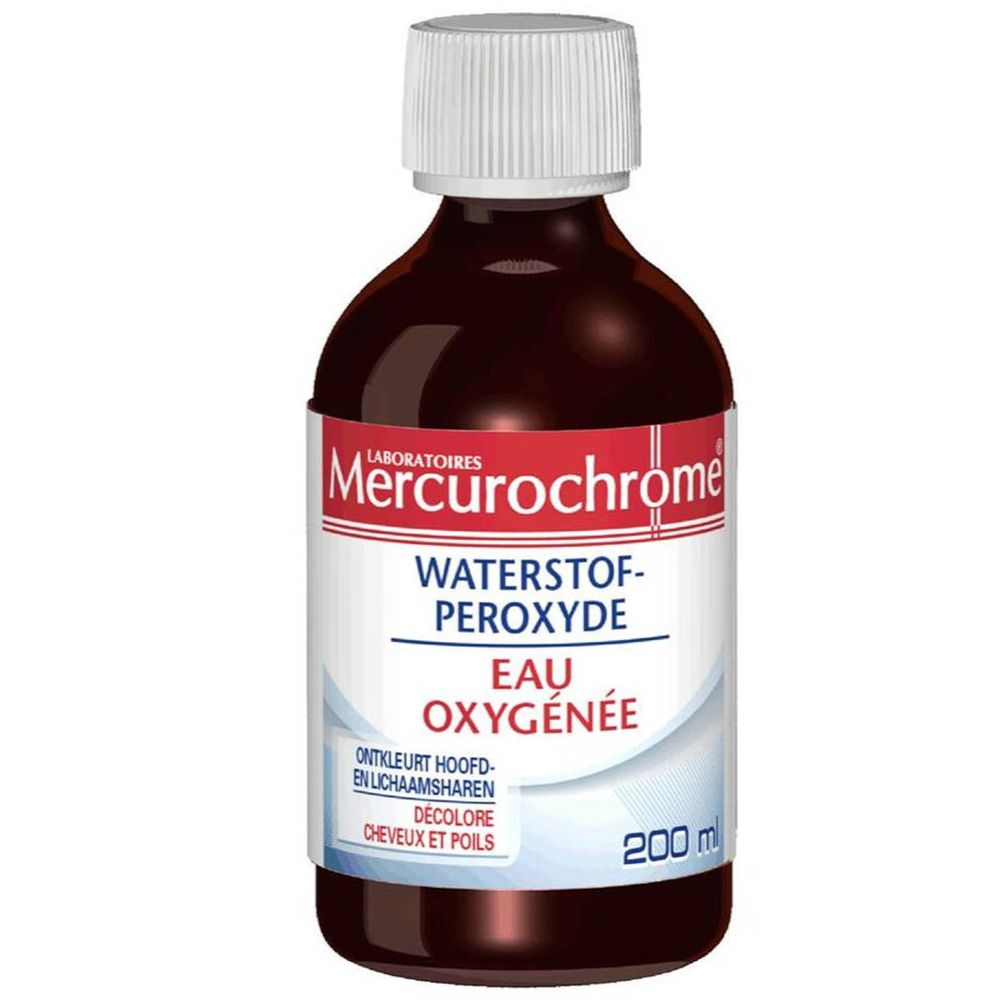 Braune Flasche mit weißem Deckel. Etikett mit "Mercurochrome", "Eau Oxygenée" und Text. 200 ml.
