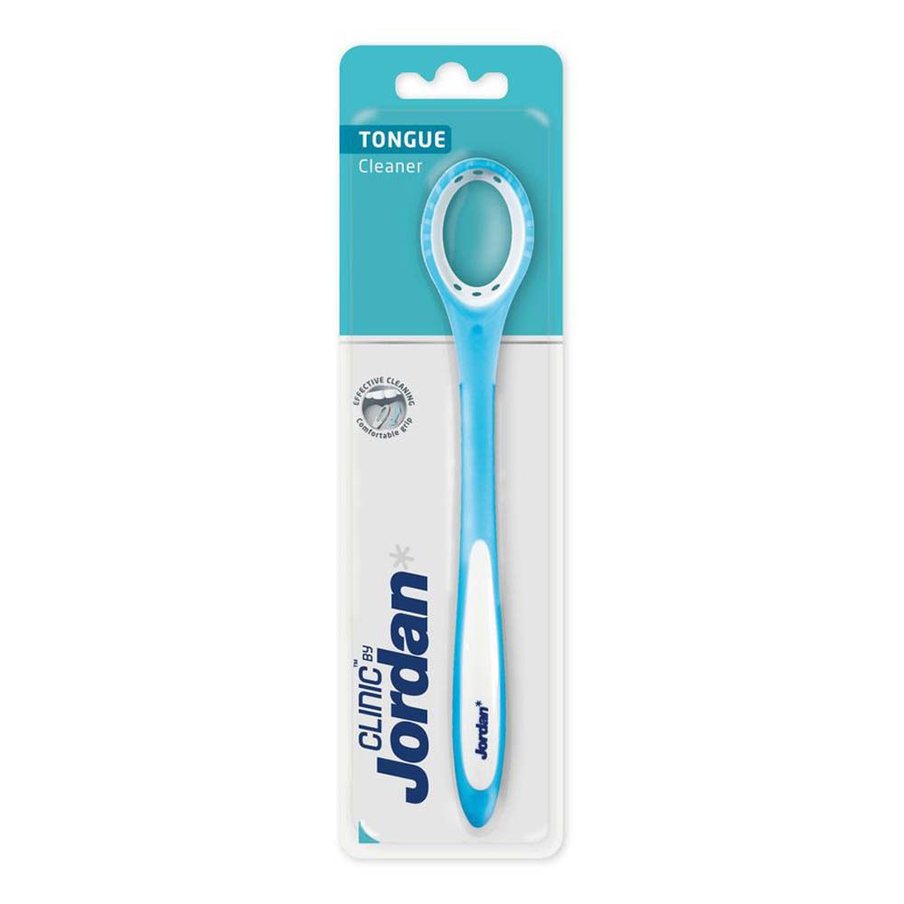 Nettoyeur de langue en emballage. Manche bleu, zone de nettoyage blanche. Marque : CLINIC by Jordan. Emballage blister.