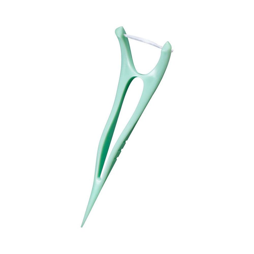 Einzelner Zahnseide-Flosser. Grünlicher Kunststoff, Y-Form. Mit Zahnseide.