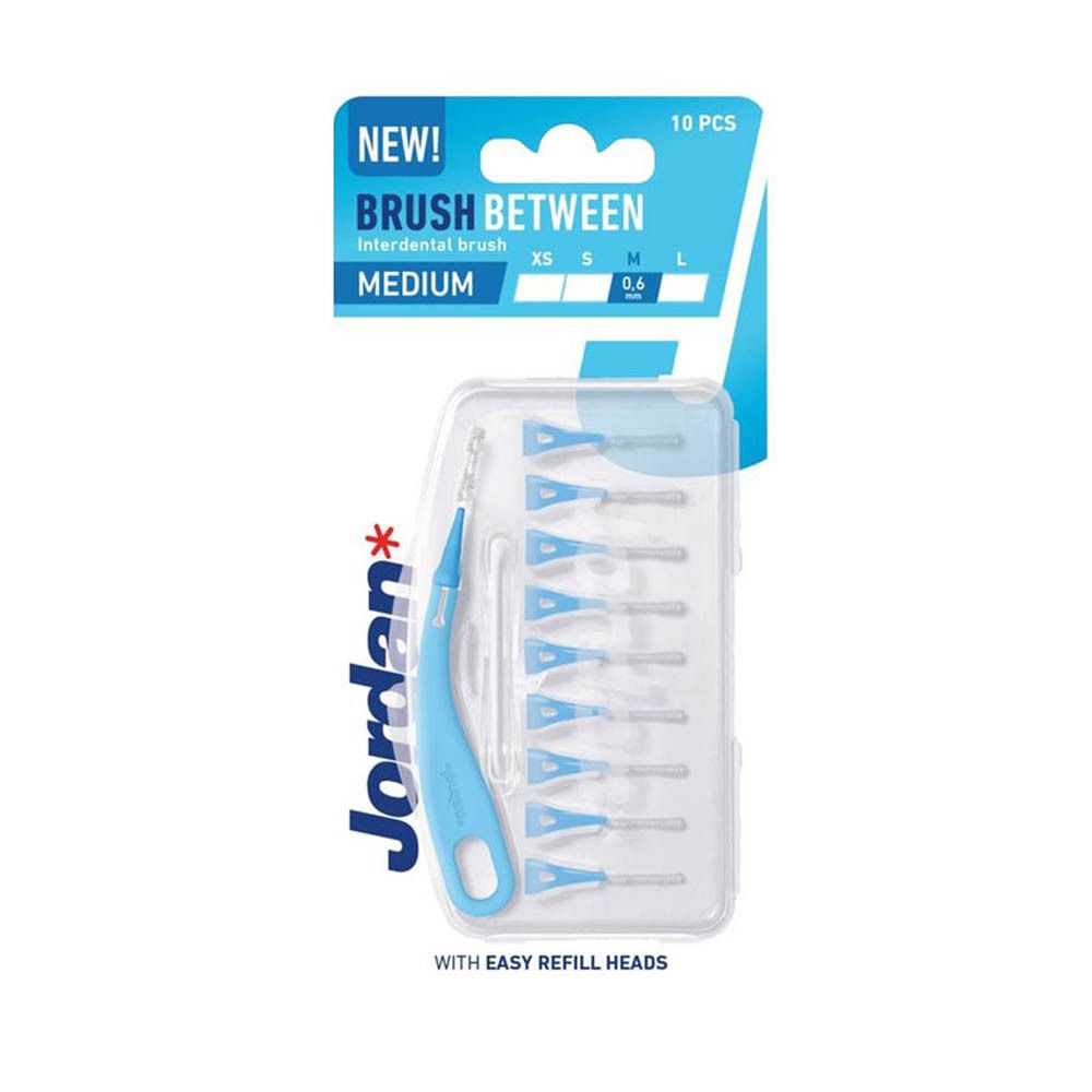 Zahnbürste Brush Between, blau, mit 10 Ersatzbürsten. Verpackung mit Produktnamen, Größenangabe und Jordan-Logo.