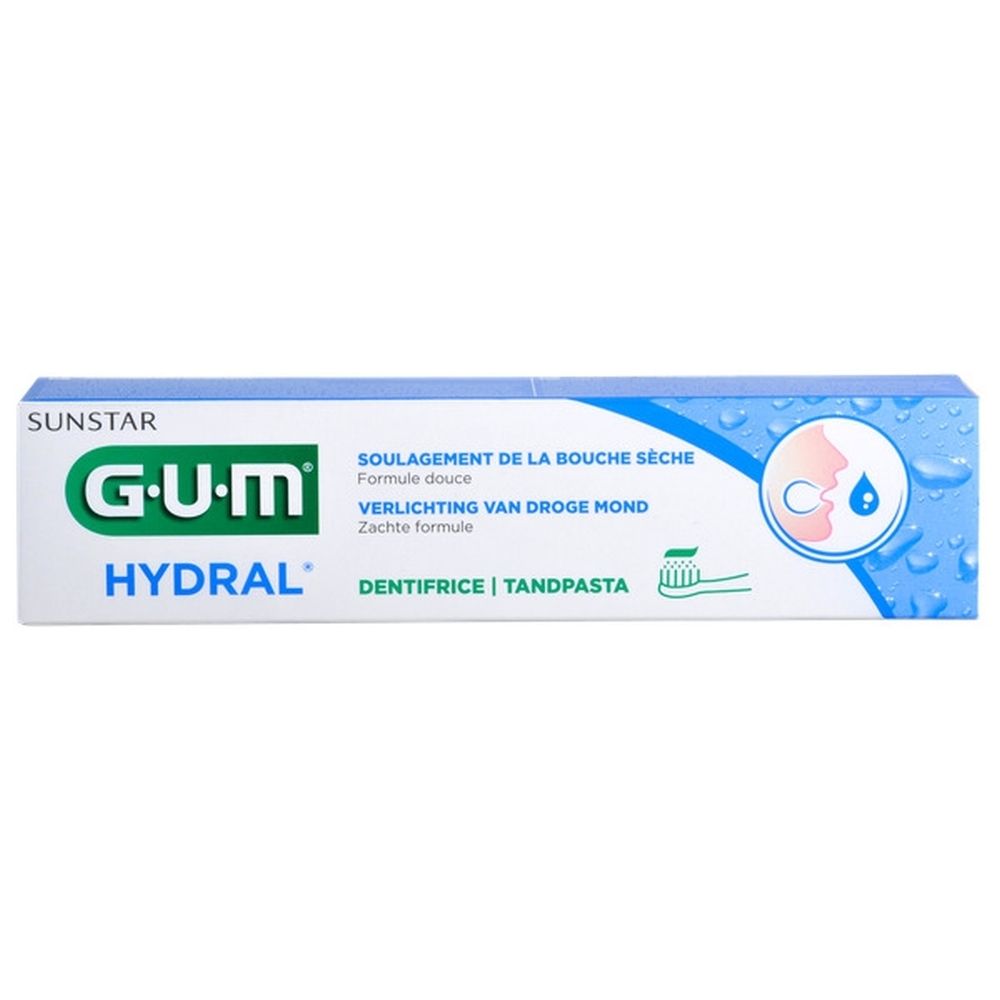 Tube et boîte de dentifrice GUM HYDRAL, blanc et bleu. Sur la boîte : symbole de bouche, inscription 'Tandpasta'.