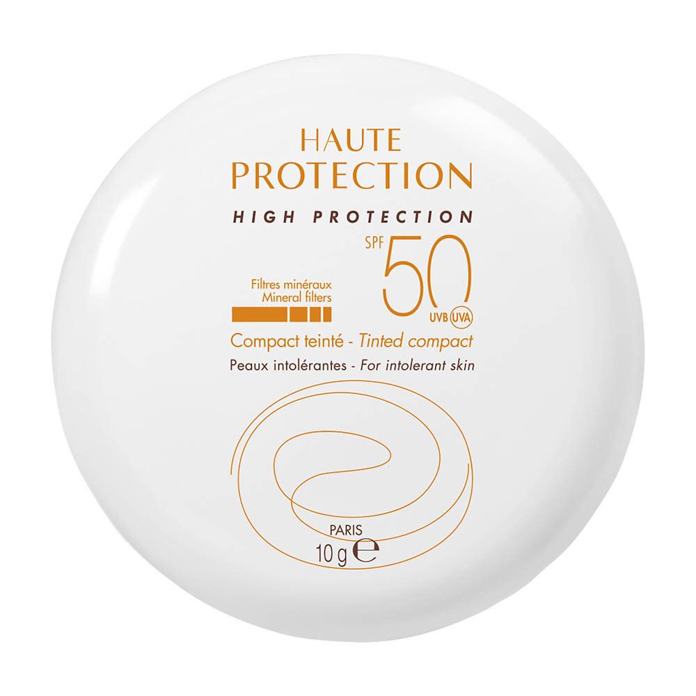 Weißer Kompaktpuder mit orangefarbener Schrift. Text: HAUTE PROTECTION, SPF 50, Compact teinté.