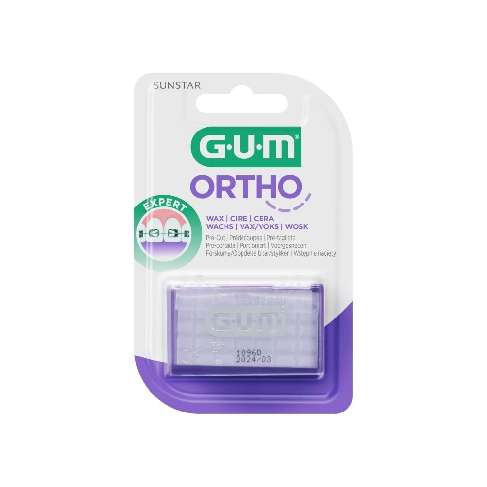 Cire GUM Ortho en blister. Emballage vert et blanc avec nom et logo. Boîte de cire transparente.