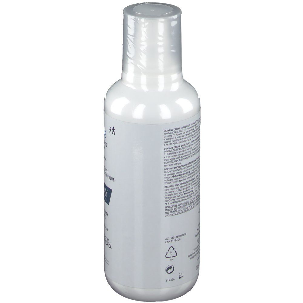 Weiße Flasche mit Text. Rückansicht. DUCRAY DEXYANE Creme. Text auf Französisch und Italienisch.