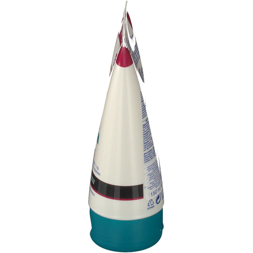 Vue latérale d'un tube. Blanc, design rouge et bleu. Inscription illisible. Bouchon turquoise.