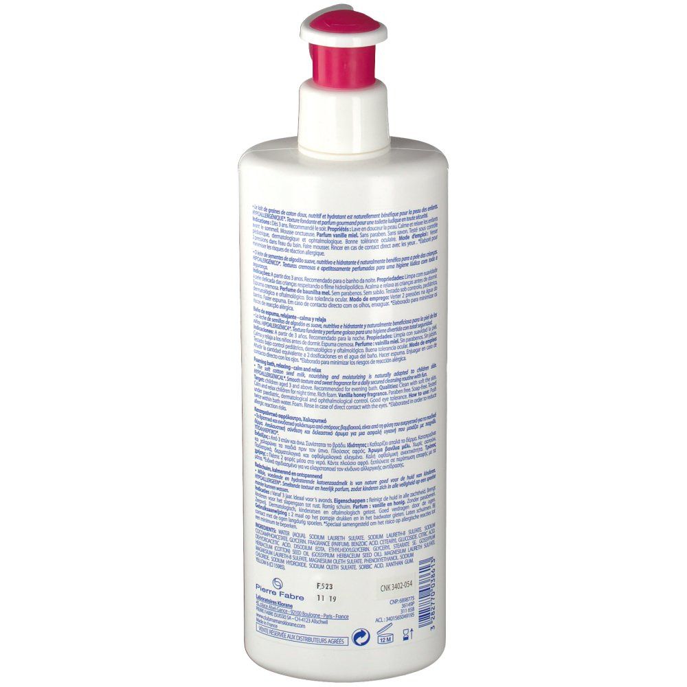 Rückseite einer weißen Flasche mit rosa Pumpkopf. Text in mehreren Sprachen. Aufschrift: Klorane. Informationen zum Produkt.