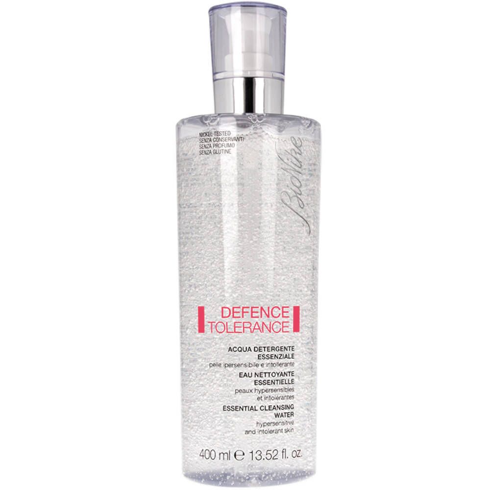 Flacon cylindrique transparent avec pompe. Inscription: DEFENCE TOLERANCE, Essential Cleansing Water. Contenance: 400 ml.