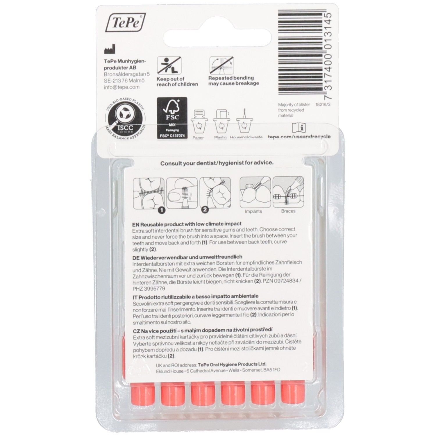 Dos de l'emballage de six brossettes interdentaires rouges. Texte, logo FSC, symboles de recyclage.