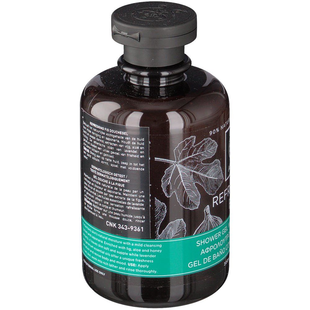 Braune Flasche mit schwarzem Deckel. Etikett mit Produktnamen, Feigen-Illustrationen und Text. Mehrsprachiger Text ist sichtbar.