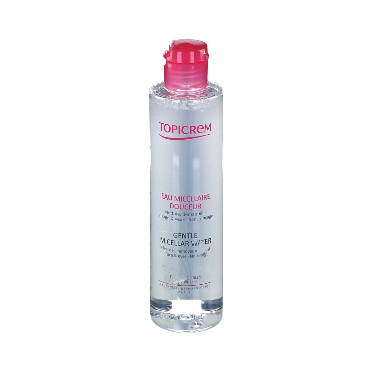 Klare Flüssigkeit in einer zylindrischen Flasche mit rosa Deckel. Aufschrift: TOPICREM, Eau Micellaire Douceur, Gentle Micellar Water.