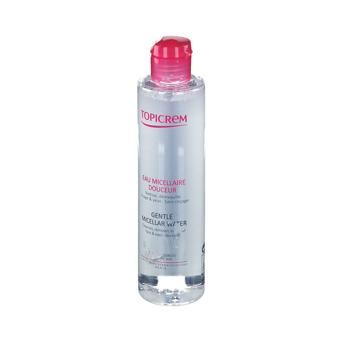 Klare Flüssigkeit in einer zylindrischen Flasche mit rosa Deckel. Aufschrift: TOPICREM, Eau Micellaire Douceur, Gentle Micellar Water.