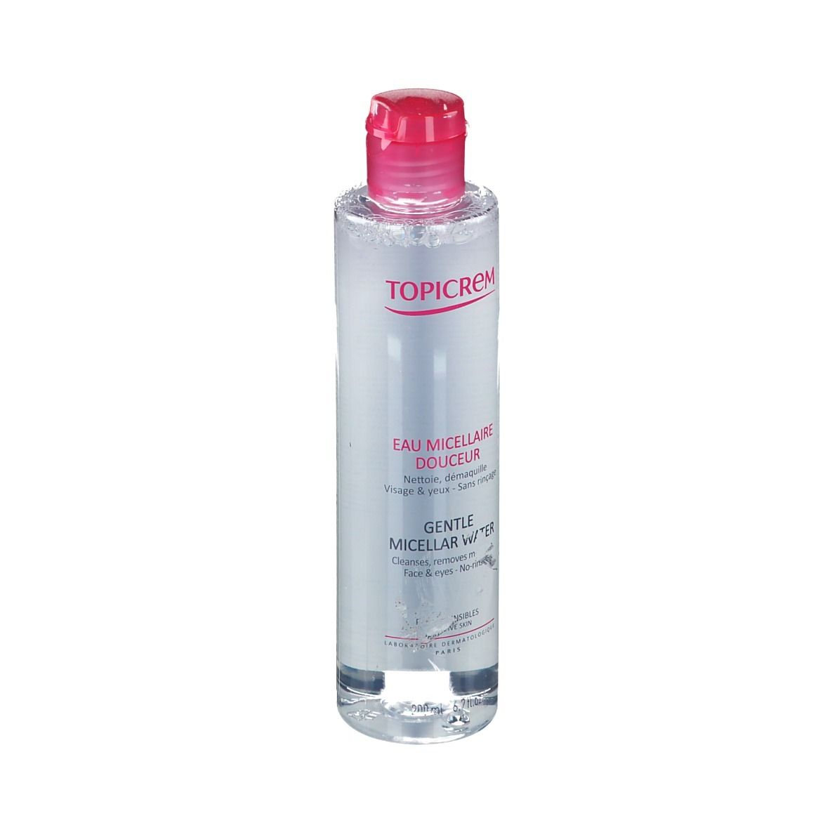 Klare Flüssigkeit in einer zylindrischen Flasche mit rosa Deckel. Aufschrift: TOPICREM, Eau Micellaire Douceur, Gentle Micellar Water.