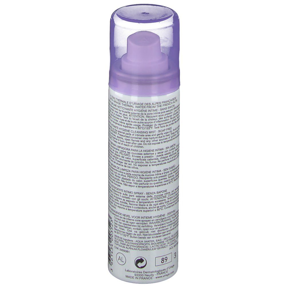 Zylindrische Flasche mit Sprühkopf. Lila und weiße Beschriftung. Text: Uriage, Gyn-Phy, Brume Nettoyante. Transparente Kappe.