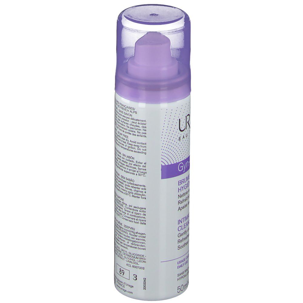 Zylindrische Flasche mit Sprühkopf. Lila und weiße Beschriftung. Text: Uriage, Gyn-Phy, Brume Nettoyante. Transparente Kappe.