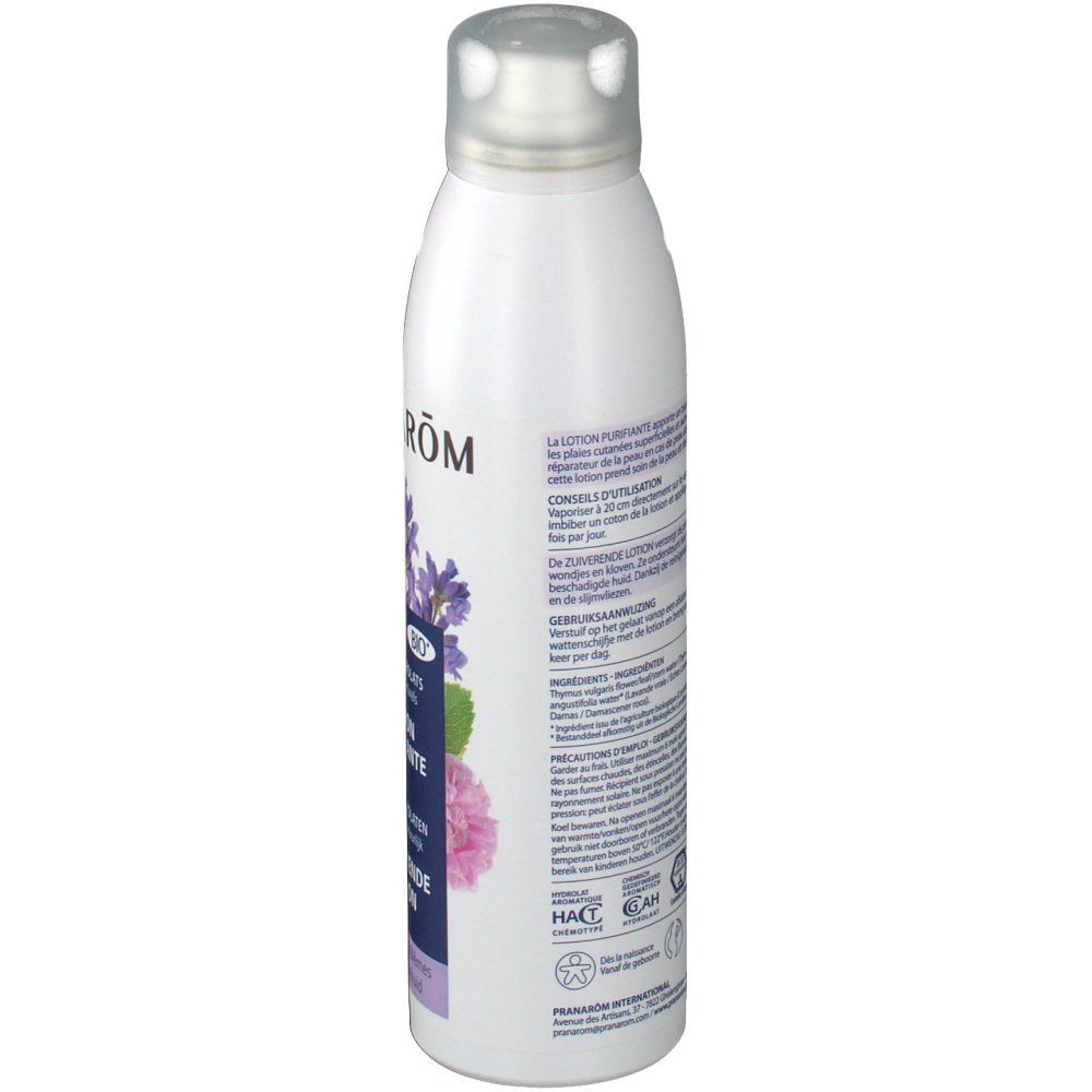 Weiße Flasche mit silbernem Deckel. Rückseite mit Text in mehreren Sprachen. Bio-Siegel und andere Zertifizierungen.