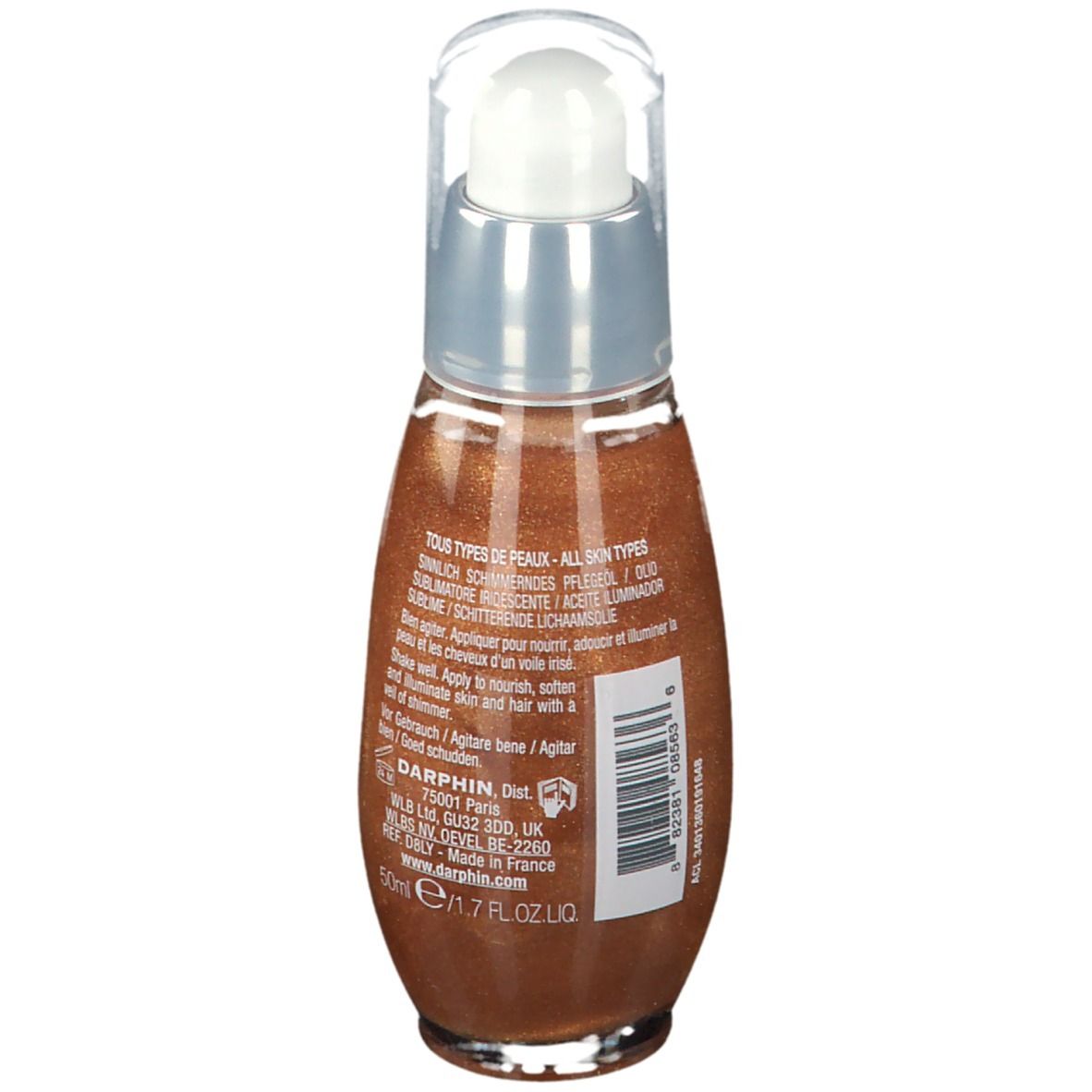 Rückansicht der Ölflasche. Klarer Deckel, silberner Kragen, braunes Öl. Text: Tous types de peaux, 50ml, Agiter avant usage.