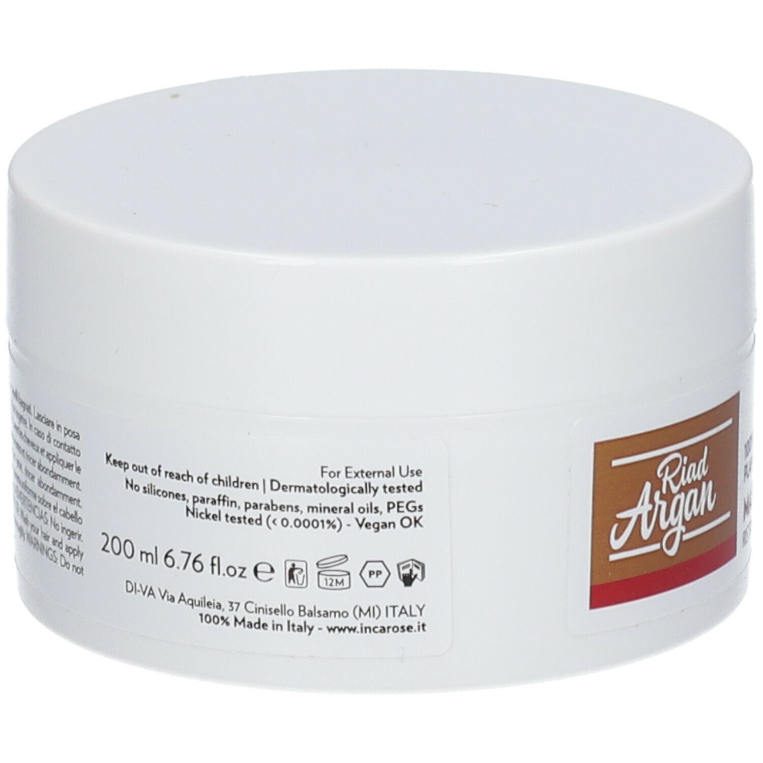 Weißer Tiegel mit Deckel. Aufschrift: Riad Argan. Text in mehreren Sprachen. 200 ml. Vegan OK. Dermatologisch getestet.