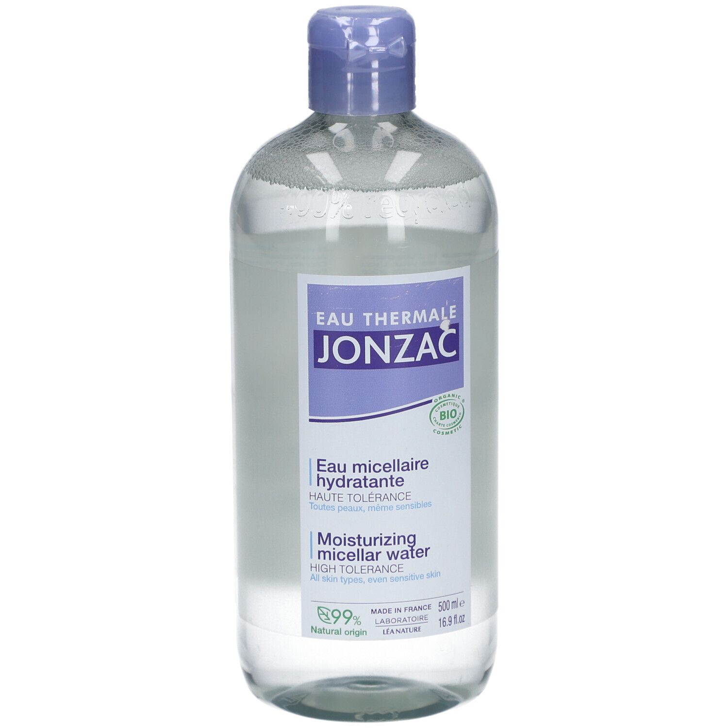 Flacon transparent avec bouchon bleu. Étiquette avec nom du produit et informations. Certification bio.