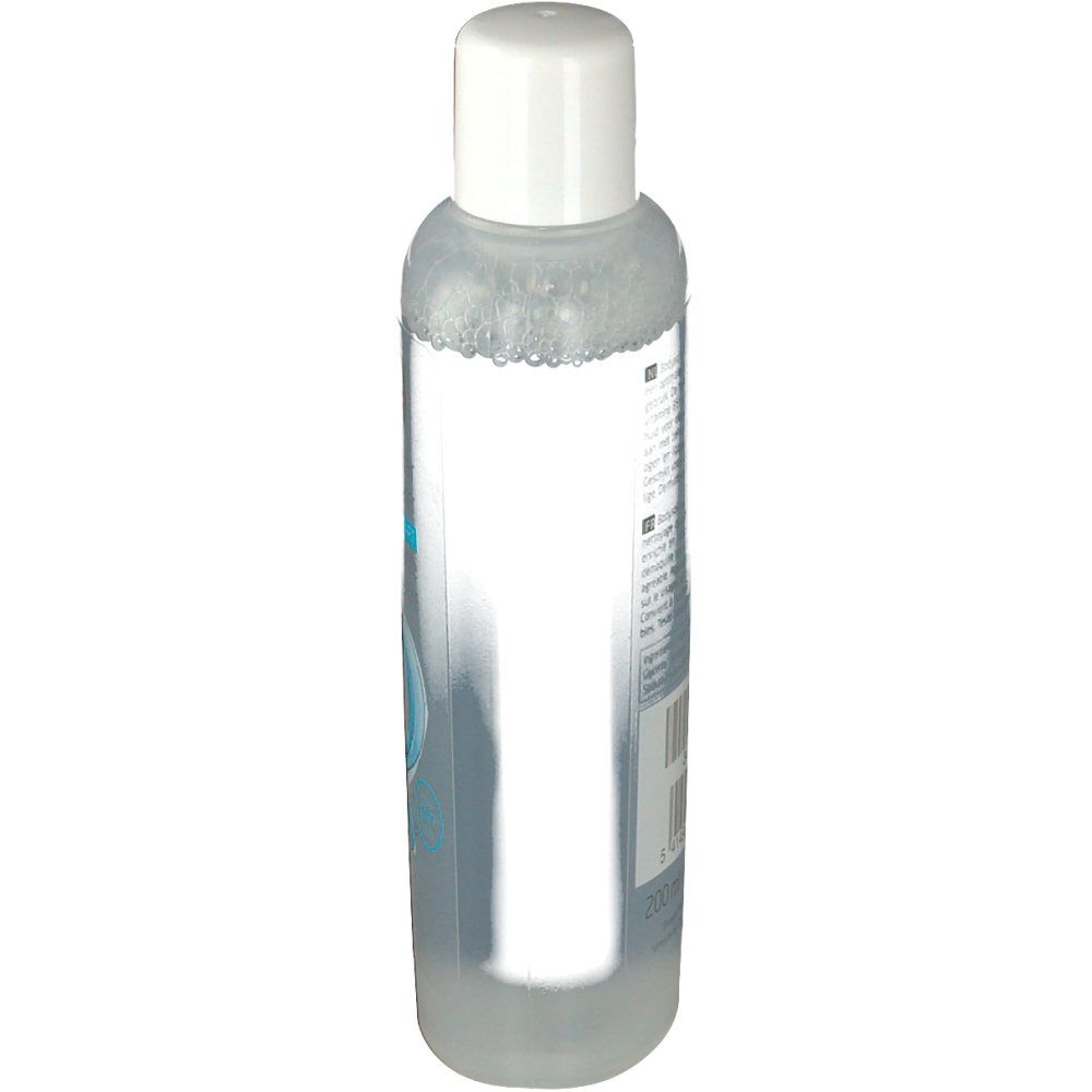 Durchsichtige Flasche mit weißem Deckel. Etikett mit Text und Barcode auf der Rückseite.