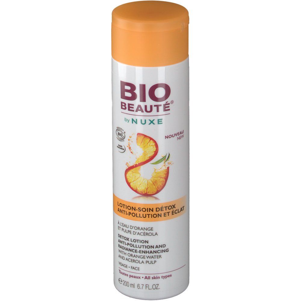 Weiße Flasche mit orangefarbenem Deckel. Aufschrift: BIO BEAUTÉ by NUXE. Detox Lotion. Mit Orangenwasser und Acerola-Fruchtfleisch.