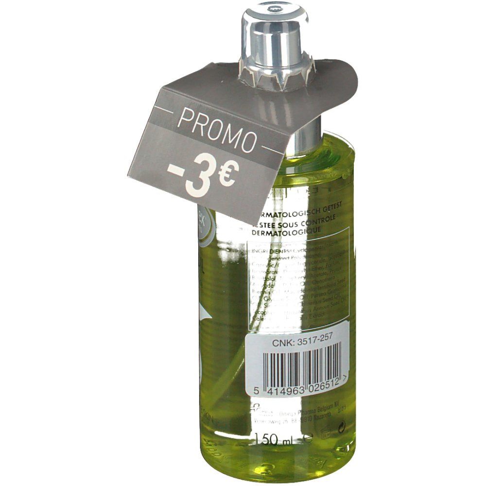 Dos du flacon en verre vert avec vaporisateur. Étiquette avec code-barres et texte. Étiquette "-3€".