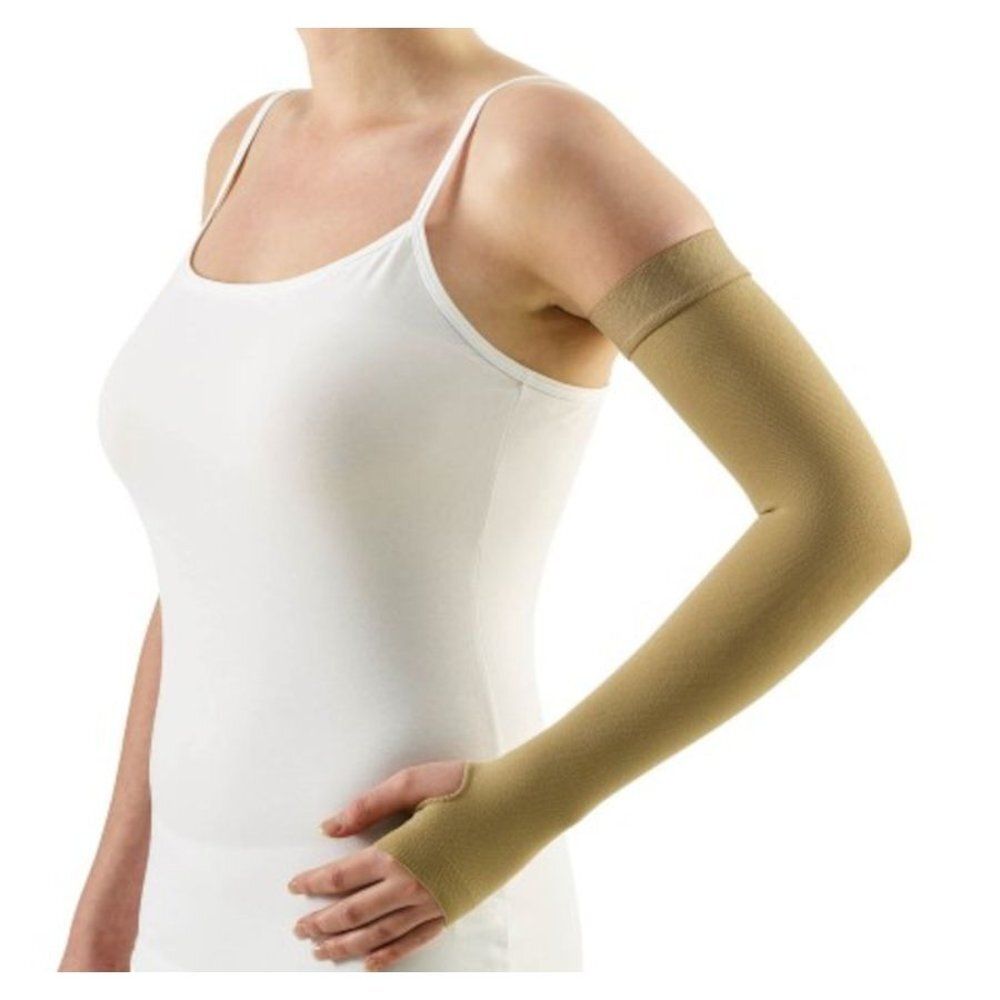 Manchon beige. Le manchon couvre le bras jusqu'au poignet. Avec trou pour le pouce.