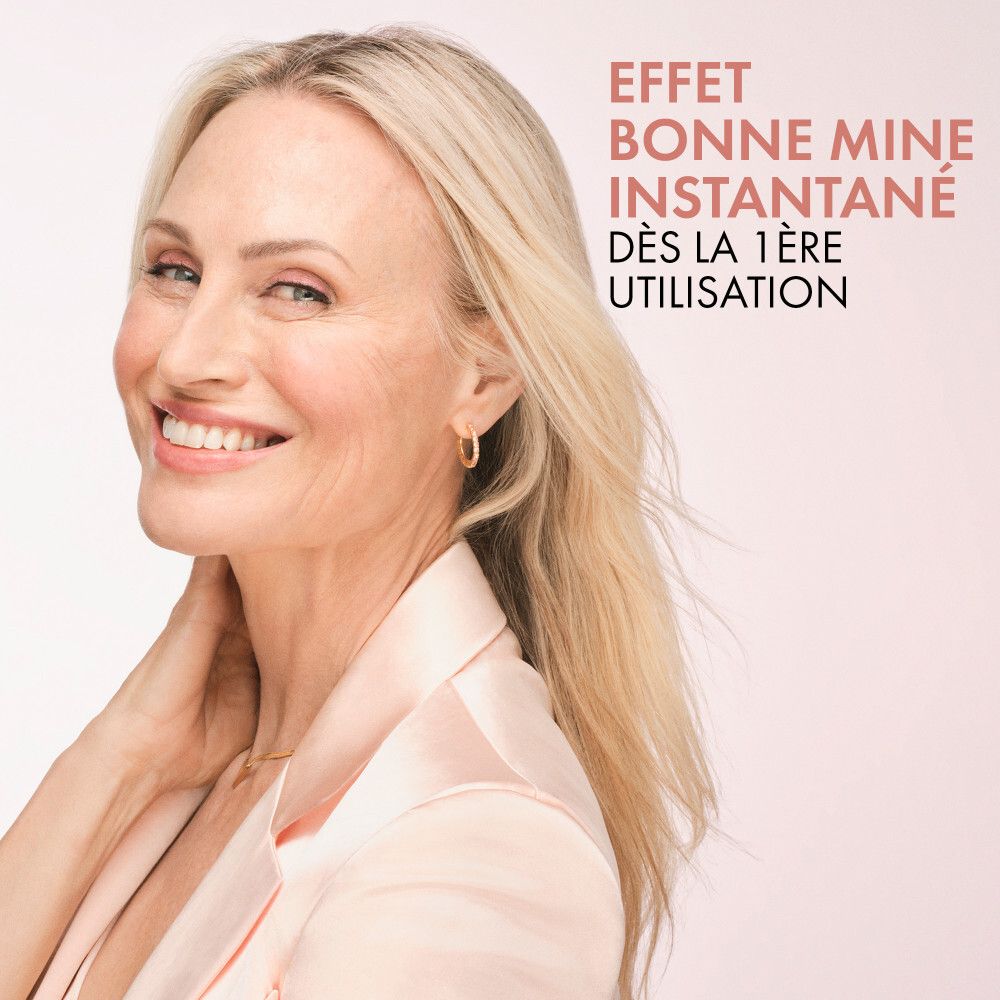 Femme souriante. Texte : Effet bonne mine instantané dès la 1ère utilisation.