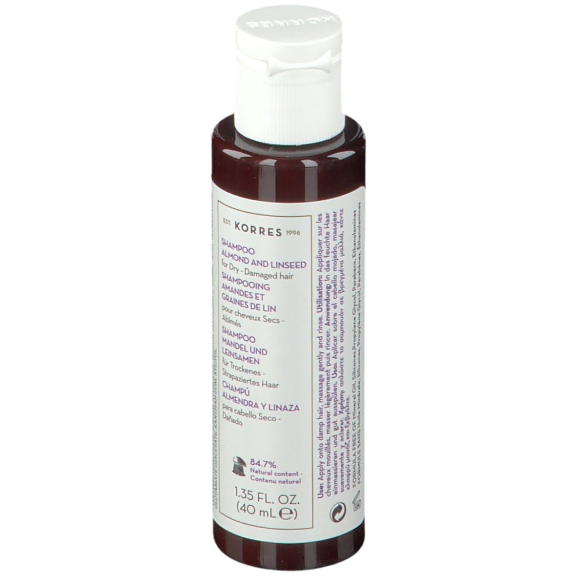 KORRES Shampoo-Flasche. Rückseite mit Text, weißer Deckel. Text: Mandel und Leinsamen für trockenes Haar, 84,7% natürliche Inhaltsstoffe.