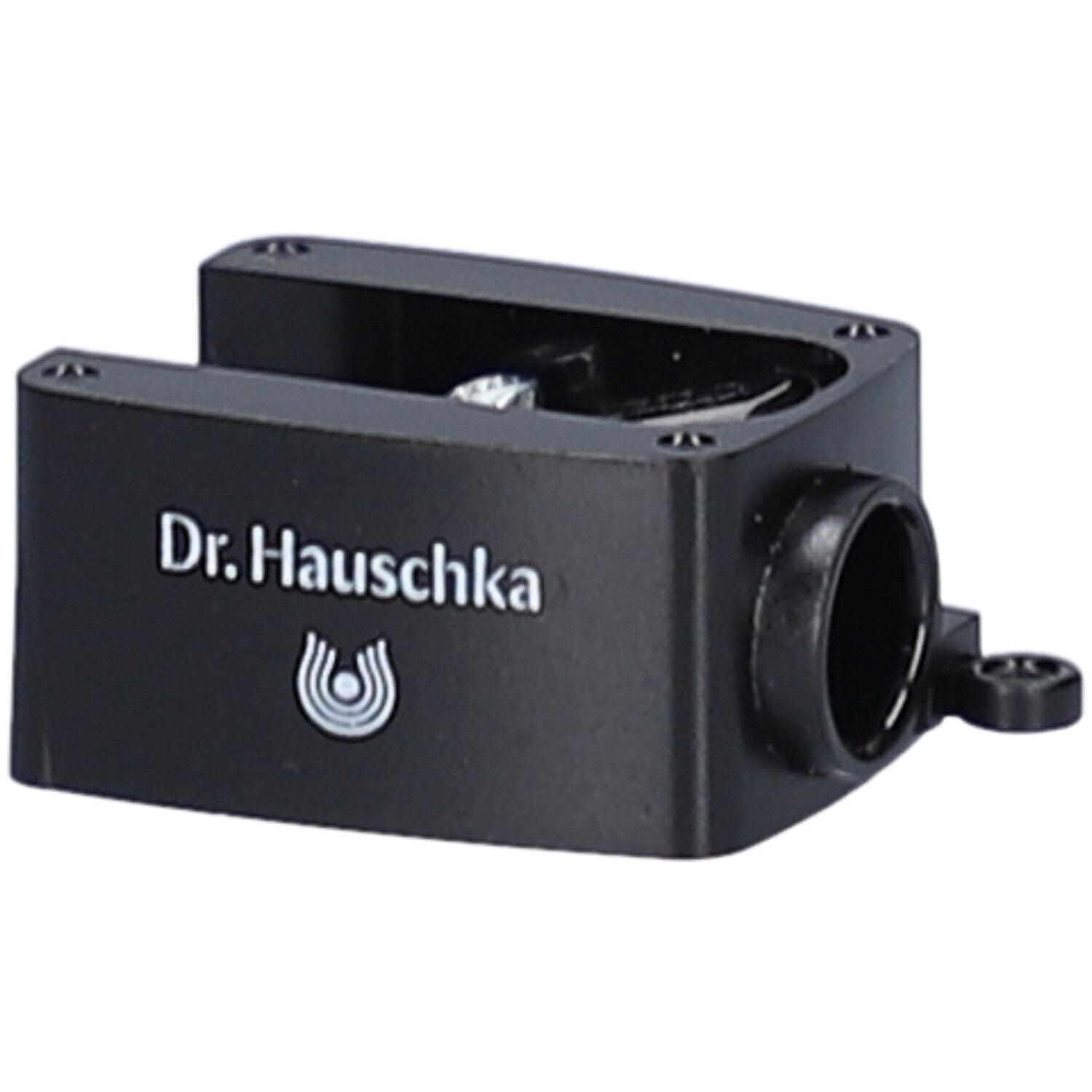 Schwarzer Anspitzer mit dem Schriftzug Dr. Hauschka und Logo. Seitlich eine Öffnung.