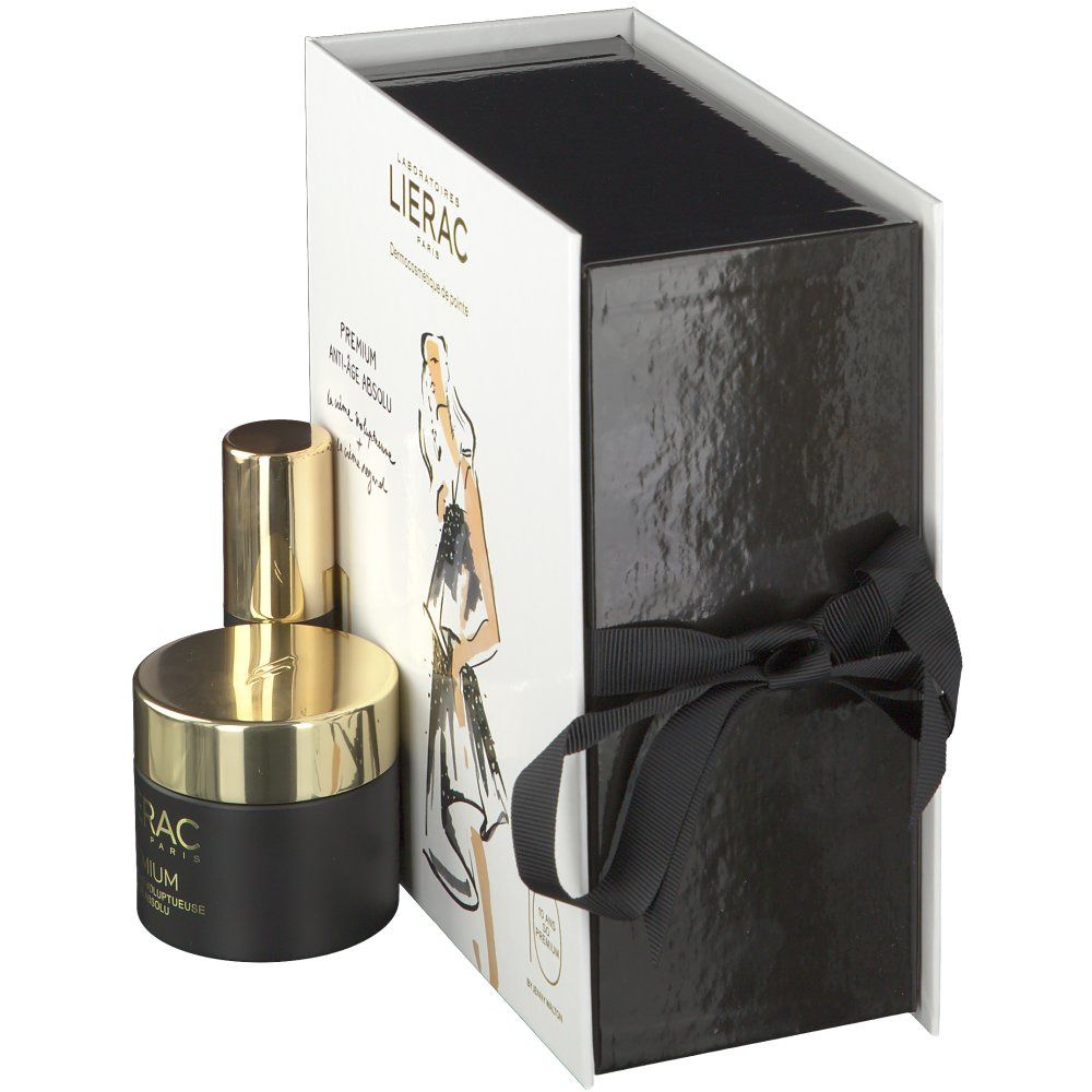 Coffret cadeau crème et contour des yeux. Pots et flacon noirs et dorés. Boîte blanche avec ruban et logo.