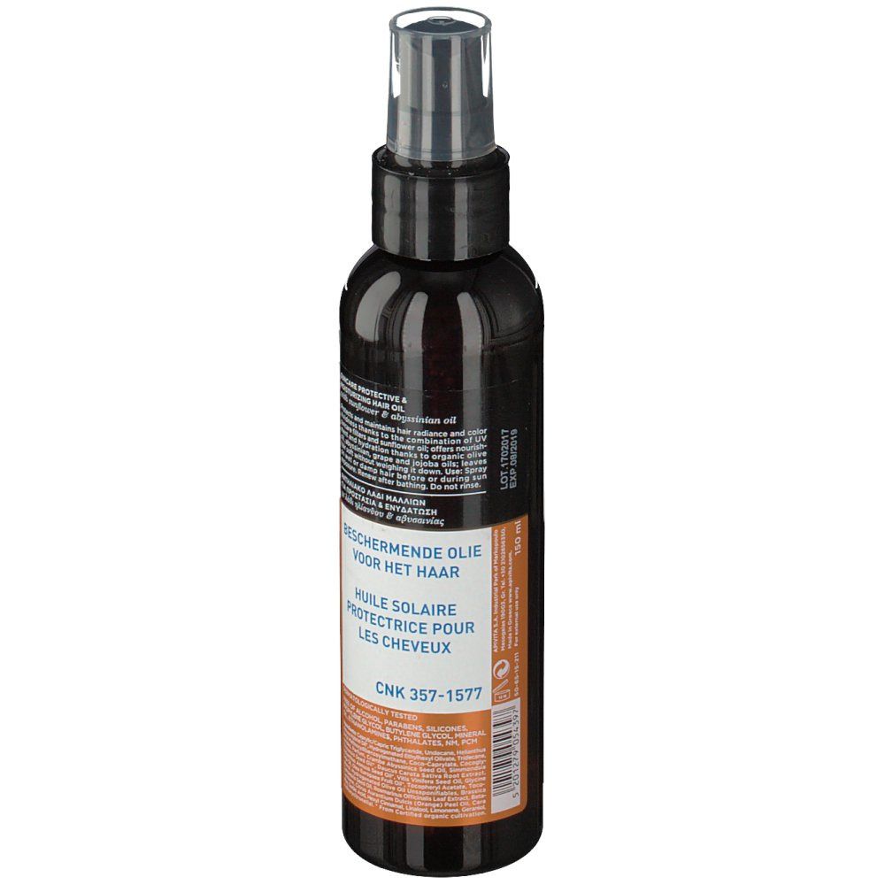 Dunkle Flasche mit Sprühkopf. Rückseite mit Text in mehreren Sprachen. CNK 357-1577.