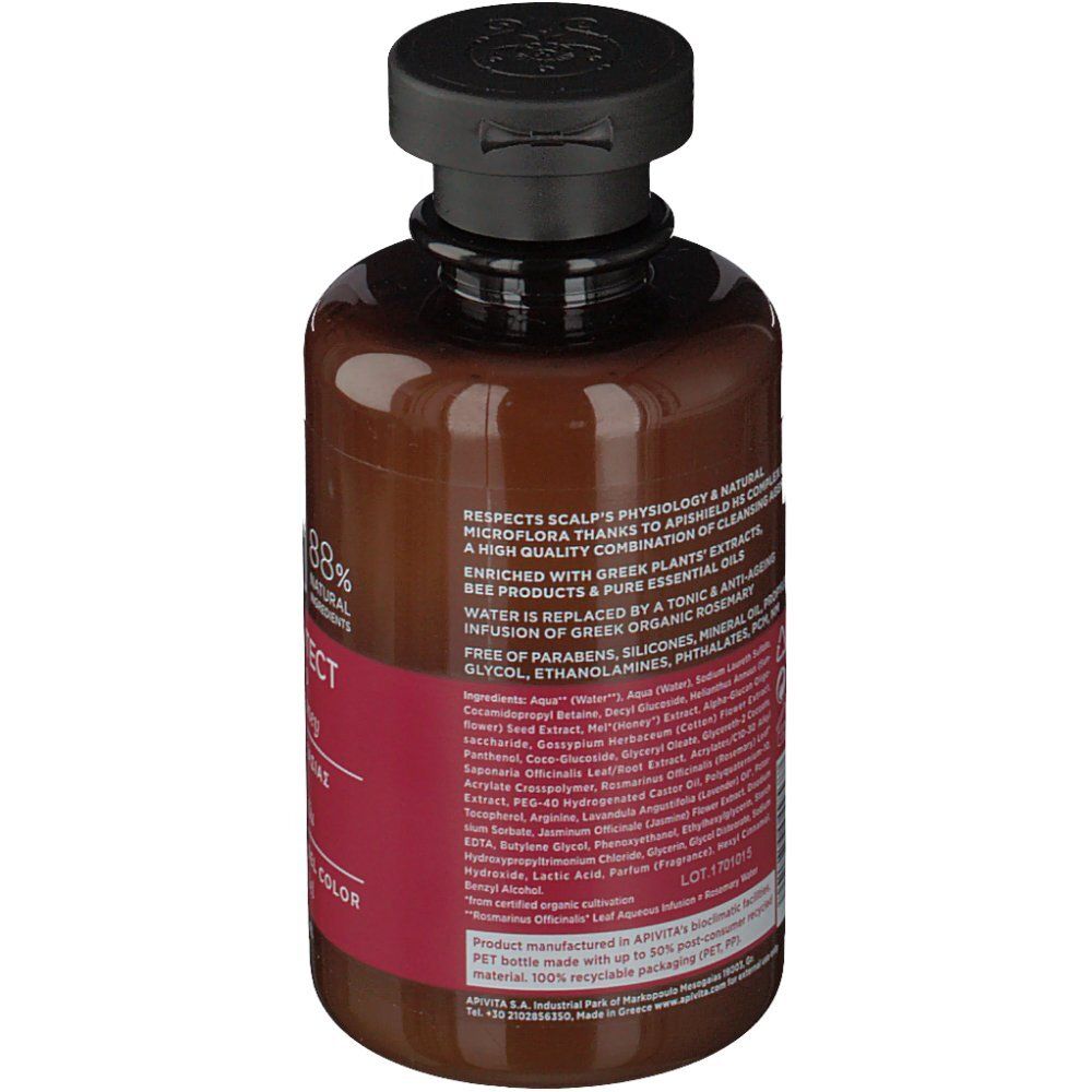 Dos du flacon marron. Texte avec ingrédients et informations sur la marque Apivita.