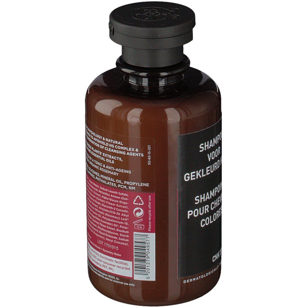 Dos du flacon marron. Étiquette avec texte en néerlandais et français.