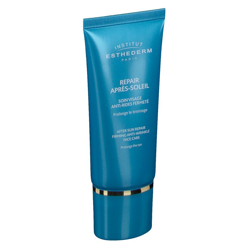Tube turquoise avec détails dorés. Texte: INSTITUT ESTHEDERM PARIS, REPAIR APRÈS-SOLEIL, SOIN VISAGE.
