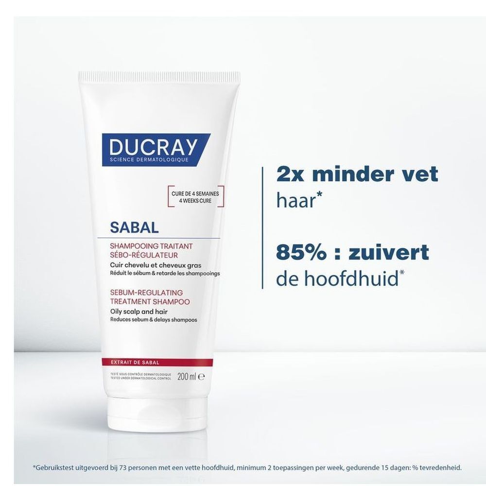 Produit et texte. Texte: 2x moins de cheveux gras. 85% nettoie le cuir chevelu.