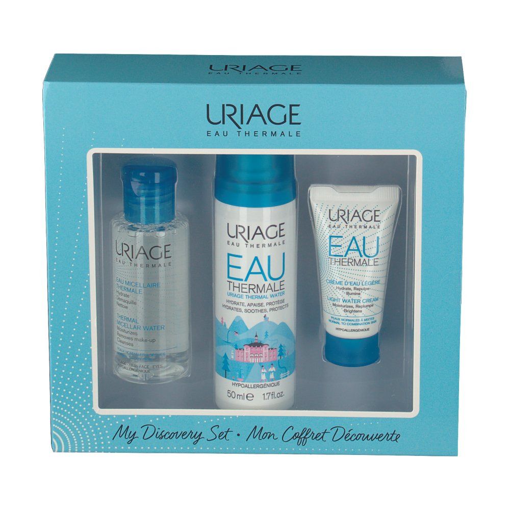 Coffret bleu clair avec trois produits Uriage. Fenêtre montrant flacons et tube. Inscription Uriage Eau Thermale.