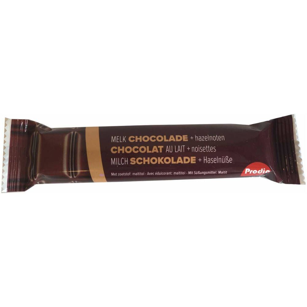 Schokoriegel in brauner Verpackung. Text: Milchschokolade + Haselnüsse. Marke: Prodia.